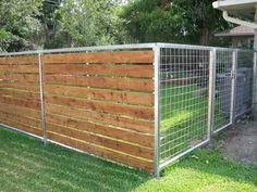 a fence made out of wood and metal