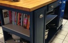 a kitchen island with books on it