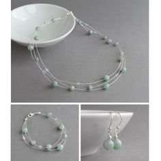 sparkling crystals and jade beads have been used to create this mint green, multi-strand jewellery set. These aqua three strand sets make ideal gifts for bridesmaids. Each duck egg blue jewellery set comes in its own little gift box and includes 1 necklace, 1 bracelet and 1 pair of drop earrings. Necklace: This sage green three strand necklace measures 18 inches (46cm) in length and is completed with a silver plated lobster clasp. I have added a 2 inch extension chain to allow you to adjust your Blue Jewellery Set, Sage Green Bridesmaids, Blue Bridal Party, Aqua Necklace, Floating Pearl Necklace, Blue Jewelry Set, Blue Jewellery, Three Strand Necklace, Blue Bridal