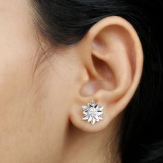 Product Details The Gold Petal Floral Stud Earring is a gorgeous piece of jewelry featuring a round cut diamond in a 6 prong setting. This elegant earring has a gold leaf design and a secure screw back closure. It makes a perfect gift for any woman who loves to accessorize with beautiful jewelry. The intricate design of the petals and leaves adds a touch of nature to these sophisticated stud earrings. With its high-quality materials and stunning design, the Gold Petal Floral Stud Earring is sure Gold Leaf Design, Floral Studs, Flower Stud Earrings, Signature Jewelry, Flower Stud, Diamond Gold, Timeless Jewelry, Gold Flower, Flower Earrings Studs