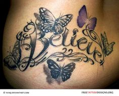 a woman's stomach with butterflies and the word believe written in cursive writing