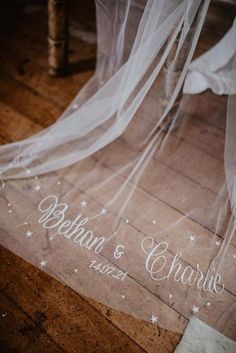 the bride and groom's name on their wedding day is etched into the floor