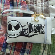 a handbag with a skull and jack on it