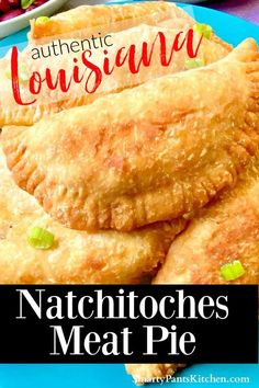 some food on a blue plate with the words authentic cuisine natchioches meat pie