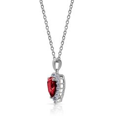 Crafted in platinum over sterling silver, this dazzling design features a 8.0mm heart-shaped simulated ruby wrapped in a shimmering frame of 1.7mm white CZ. Buffed to a brilliant luster, this pendant suspends along an 16.0-inch cable chain, with a 2.0-inch extender, that secures with a spring-ring clasp. Heart-shaped Ruby Jewelry With Prong Setting, Heart Shaped Ruby Jewelry With Prong Setting, Red Heart Cut Diamond Accented Jewelry, Oval Cubic Zirconia Jewelry For Valentine's Day, Red Heart Cut Jewelry With Diamond Accents, Red Heart Cut Diamond Accent Jewelry, Silver Pear-shaped Jewelry For Valentine's Day, Pear-shaped Silver Jewelry For Valentine's Day, Heart Cut Ruby Jewelry With Prong Setting