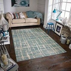 a living room filled with furniture and decor