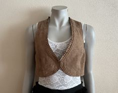 Brown Vest Women's Vest Brown Women Vest Cropped Waistcoat Short Womens Vest Small Size Measurements (lying flat): Length(back): 14"/ 36 cm Pit to pit: 16 3/4"/ 42.5 cm Please check measurements to insure a proper fit. Remember to allow yourself some extra room for movement. You can compare these with something from your closet that fits you well. Please convo me if you need additional measurements. Condition: Great Vintage Condition N.B. Color may slightly differ from picture SHIPPING * I ship Brown Spring Vest For Workwear, Brown Vest For Workwear In Spring, Brown Spring Workwear Vest, Vintage Spring Vest Outerwear, Vintage Vest For Spring Workwear, Brown Vest Women, Cropped Waistcoat, Gray Outfits, Women Vest