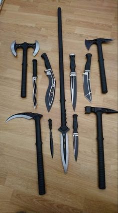 several different types of knives on a table