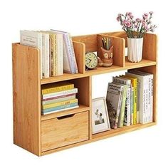 a wooden book shelf filled with lots of books