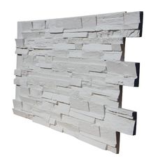 a white brick wall with black trim on the bottom and sides, against a white background