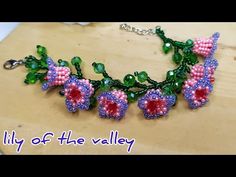 the necklace is made with beads and flowers