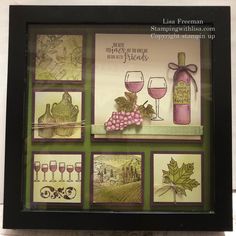 an image of wine and grapes on display in a frame