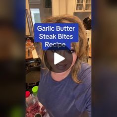 a woman is standing in front of a plate of food with the caption garlic butter steak bites recipe