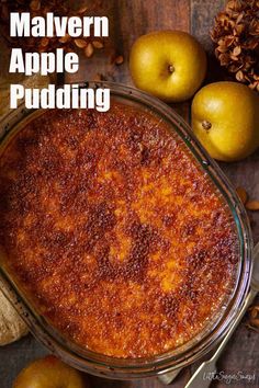 an apple pudding in a glass dish with apples around it and the words, malvern apple pudding