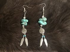 Authentic Native American Navajo Zuni Kingman Turquoise with 2 Feathers Sterling Silver  Handcrafted by Navajo Artist R. Sellers Great for a gift❤️ Present in virtually every Native American tribe, the feather symbol is universally recognized as a representation of trust, strength, wisdom, freedom, and honor. Incorporated into many sacred pieces of Native American wear, the feather is easily one of the most respected symbols. Feather Symbol, Jean Jewelry, Feather Symbolism, Silver Turquoise Jewelry, Native American Tribes, Kingman Turquoise, Feather Earrings, Blue Jean, Silver Turquoise