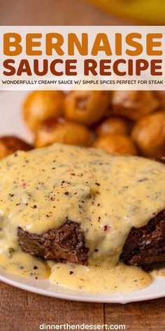 a white plate topped with meat covered in gravy