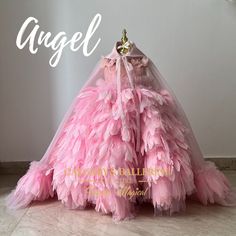 Angel floor length feather gown includes ballerina pink feather dress, cape and head piece. Angel is a floor length feather ball gown with a pleated pearl detailed bodice and handmade flower on each shoulder. Breathtaking pink feathers and countless pink blooms cascade to the floor in this exquisite pink feather dress. The Angel gown features a pleated bodice and handmade pink flowers on each shoulder, making it a perfect choice for any special occasion. From flower girls at weddings to enchanti Feather Ball Gown, Feather Layers, Pink Feather Dress, Birthday Princess Dress, Feather Gown, Dress Cape, Ballerina Pink, Pink Long Dress, Angel Feathers