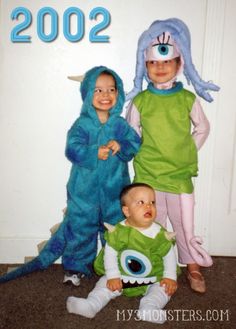 three children dressed up in costumes standing next to each other with the words 2000 written on them