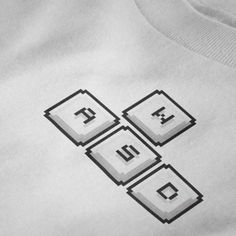 --|[ About This T-Shirt ]|-- The WASD Pixel Art T-Shirt is perfect for gamers of all kinds, especially those fond of computer games. It makes for a swell birthday gift for friends & family fond of gaming culture. Our minimalist pixel art is printed onto the Gildan 64000 unisex, softstyle t-shirt. Made from 100% cotton, our shirt is guaranteed to be soft, stretchy, and form-fitting - especially after its first wash. Twill tape is sewn over the shoulder seams to stabilize the back of the garment and prevent stretching. The collar is made with ribbed knitting to prevent curling damage, make it highly elastic, and help the shirt retain its shape. There are no side seams to reduce fabric waste and give the fabric a more pleasing aesthetic.  * Available in 5 colors!  * 100% cotton * Light, stret White Graphic Design Top As Gift, White Graphic Design Top As A Gift, Graphic Design White Top As Gift, White Graphic Design Top For Gift, Gamer Style White Top For Streetwear, White Cotton Gamer T-shirt, Pixel Clothes, Birthday Gift Best Friend, Aesthetic Birthday