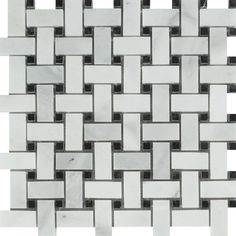 a white and black mosaic tile pattern