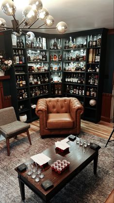 Bourbon wall whiskey shelf Home Office Whiskey Bar, Spare Living Room Idea, Bourbon Home Decor, Whiskey Room Design, Bourbon Display Cabinet, Moody Whiskey Room, Bourbon Tasting Room Ideas, Bourbon Room Man Cave