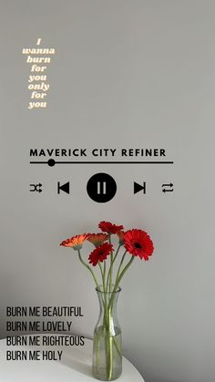 there is a vase with red flowers in it and the words maverick city refiner above it