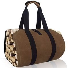 a brown bag with black straps and some wood stacked on top of each other in front of a white background