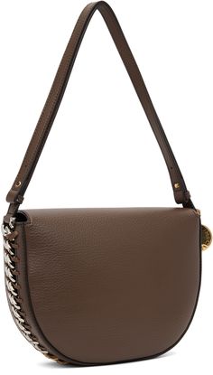 Grained faux-leather shoulder bag in brown. · Whipstitching and curb chain detailing throughout · Adjustable and detachable shoulder strap · Logo charm at side · Magnetic press-stud flap · Patch pocket at interior · Faux-suede lining · H7.25 x W9 x D2.5 Made from cruelty-free, non-animal materials. Supplier color: Brown Stella Mccartney Frayme, Flap Shoulder Bag, Press Studs, Curb Chain, Stella Mccartney, Faux Suede, Patch Pocket, Leather Shoulder Bag, Cruelty Free