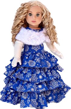 a doll with blonde hair wearing a blue dress