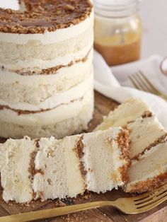 there is a cake on the table with two slices cut out and ready to be eaten