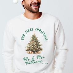 ✨🎄 Celebrate your first holiday season together in style with this Custom Matching Couple Christmas Sweater "Our First Christmas" as Mr. & Mrs.! Perfect for newlyweds, this cozy and festive sweater is a must-have for couples celebrating their first Christmas as husband and wife. Featuring a beautifully decorated Christmas tree design, personalized with your last name and the year you were married, this sweatshirt makes a thoughtful gift for newlyweds, winter weddings or holiday photoshoots.  🎄 Christmas Ugly Sweater Party, Couples Christmas Sweaters, Couple Matching Outfits, Married Shirt, Couple Christmas, Honeymoon Shirts, Ugly Christmas Sweater Party, Ugly Sweater Party, Our First Christmas