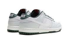 The Nike Dunk Low “Vintage Green” is a colorway of the retro shoe with a white-and-green design.  A versatile option, the Dunk Low “Vintage Green” has a white tumbled leather base and Photon Dust leather overlays.  A white leather Swoosh can be found on both sides of the shoe, and a white “Nike” logo is embroidered on the heel.  Vintage Green accenting can be found on the leather heel tab, inner lining, and on the laces.  A white rubber midsole and Vintage Green rubber outsole complete the look. Nike Dunk Low Vintage Green, Jordan Golf, Nike X Travis Scott, Jordans Women, Jordan 2, Nike Dunk High, Kids Uggs, Womens Jordans, Yeezy Shoes