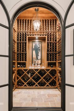 an open wine cellar with many bottles in it