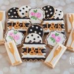 decorated cookies with black and white designs on them