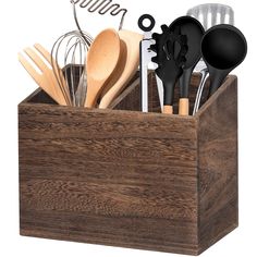 a wooden box with utensils and spoons in it