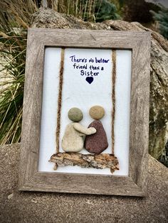 there's no better friend than a couple sitting on a swing made out of rocks