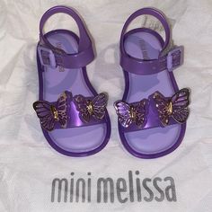 New Mini Melissa Butterfly Sandals Size 6 Toddler Velcro Strap. Please View Pictures For A Better Description Of The New Item. Shoe Box Not Included Purple Synthetic Jelly Sandals For Summer, Purple Open Toe Jelly Sandals For Summer, Purple Slide Sandals For Summer, Purple Adjustable Sandals For Party, Purple Jelly Sandals For Beach In Spring, Casual Closed Toe Purple Sandals, Casual Purple Closed Toe Sandals, Purple Slide Sandals For Spring, Adjustable Purple Sandals For Vacation