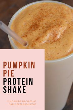 pumpkin pie protein shake in a white cup with a pink sticker over it and the words, pumpkin pie protein shake