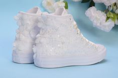 "All orders for trainers / sneakers to USA/Canada will be delivered in 2-4 business days after production without extra costs Made with love for your wedding day by Lovin Bridal - More Wedding shoes at our shop : http://lovincollection.etsy.com It's the bride's prerogative to wear the comfiest bride shoes. If you're set on heels then one option is to have your Lace Wedding Converse trainers as a second pair of bridal shoes to change into for the reception. There are so many options for your wedd White High-top Sneakers For Wedding, White Round Toe Sneakers For Bridal Shower, White Round Toe Wedding Shoes For Bride, Custom Converse Shoes, Tiffany Birthday, Bridal Converse, Shoes For Bride, Bridal Sneakers, White High Top Converse