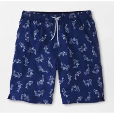 Elevate Your Swimwear Style With These Peter Millar Men's Atlantic Blue Secret Cove Graphic Print 8" Swim Trunks.The Stunning Blue Color And Intricate Graphic Print Will Definitely Make You Stand Out At The Beach Or Pool. The Trunks Come With Built-In Brief, Elastic Waist, And Drawstring To Ensure A Comfortable Fit. Made With A Blend Of Polyester And Spandex, These Trunks Are Quick-Drying And Perfect For Any Water Activity. The Back Pocket Adds A Touch Of Functionality, Making It Easy To Carry S Spring Printed Blue Swim Trunks, Spring Blue Printed Swim Trunks, Casual Blue Swimwear With Relaxed Fit, Casual Blue Printed Swimwear, Blue Swim Trunks For Spring, Casual Blue Swim Trunks For Spring, Blue Swimwear With Pockets For Spring, Navy Casual Short Swimwear, Casual Navy Swimwear For Spring