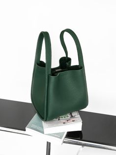 Emerald Bucket Bag | Medium Fashion Bag – Songmont Modern Solid Color Bucket Bag With Top Handle, Modern Solid Color Top Handle Bucket Bag, Green Leather Bucket Box Bag, Modern Bucket Satchel For Office, Green Tote Bucket Bag For Office, Modern Green Bucket Bag With Detachable Handle, Modern Green Bucket Shoulder Bag, Modern Green Bucket Bag For Shopping, Minimalist Soft Leather Bucket Bag For Office