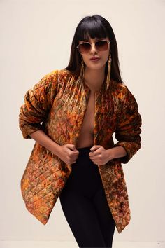 Introducing an exquisite zari quilted statement jacket, featuring an abstract floral print crafted in soft velvet. This unique piece combines luxury with style, making it a standout addition to any wardrobe. Elevate your look with this statement jacket, perfect for adding a touch of elegance to any outfit. Womens Quilted Jacket, Statement Jacket, Orange Jacket, Open Neck, Abstract Floral Print, Floral Abstract, Jacket For Women, Velvet Color, Fashion App