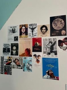 there are many posters on the wall