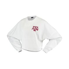 Whether you're a current student, alumni or just a superfan, every member of the Texas A&M Aggies franchise needs a solid collection of gear. This season, spruce up your look with this chic Raw Hem Cropped Spirit Jersey T-shirt! The fierce Texas A&M Aggies graphics and super-soft blend make this fun top a must-have addition to your closet! Brand: Spirit Jersey Crew neck Long sleeve Machine wash, tumble dry low Made in the USA Officially licensed Raw hem Screen print graphics Collegiate Letter Print Tops For Fall, Collegiate Style Fitted Tops For Spring, Relaxed Fit Tops For College In Spring, Collegiate Crew Neck Tops For Spring, Collegiate Spring Crew Neck Tops, Spring Collegiate Crew Neck Tops, Collegiate Spring Graphic Print Tops, Spring Collegiate Graphic Print Tops, Oversized Collegiate Long Sleeve Top