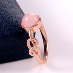 Sweet Pink Round Opal Refine Trendy Weave Rose Gold Rings For Women, Pd176 Stone: Cubic Zircon Material: Rose Gold Plated Brass Attractive Packaging Buy Any 2 Items For $25 (Make Bundle) 100% Brand New Thank You! Pink Feminine Rings For Anniversary, Feminine Pink Rings For Gift, Feminine Pink Rings For Anniversary, Pink Rose Quartz Promise Ring, Pink Rose Quartz Rings For Anniversary, Pink Rose Quartz Anniversary Rings, Pink Rose Quartz Wedding Rings, Rose Gold Bridal Jewelry, Infinity Knot Ring