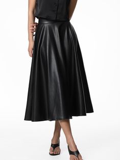 Vegan leather skirt in midi length with flared bottom. A Line style. Model is in MINUSEY ONE SIZE. ✔️ Free worldwide express shipping over $100✔️ Loved by 6,500+ customers✔️ Limited edition collections, maximum style⠀⠀⠀⠀⠀⠀⠀⠀⠀Stay ahead of the trend with can’t-find-anywhere-else staples. Your closet will thank you 💕 * MINUSEY ONE SIZE = EU 34-38, US 2-6* 100% PU Leather* Dry clean* Made in Korea - Model Height: 172cm/5'7" (US2, EU34) Spring Knee-length Leather Skirt, Relaxed Flared Leather Skirt, Fitted Leather Flared Skirt, Leather Pleated Skirt For Party, Leather Party Skirt, Spring Leather Flared Skirt, Leather Flared Skirt For Spring, Chic Leather Flared Skirt, Leather Midi Skirt For Party