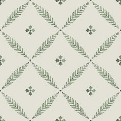 a green and white pattern with leaves on the bottom, in an argyle style design