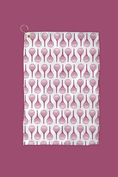 a pink and white kitchen towel hanging from a hook on a purple background with an image of spoons