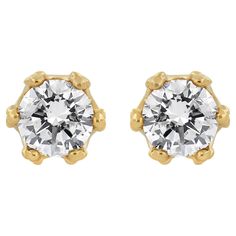 With regal hidden details, these diamond stud earrings are anything but ordinary. From the front, these 14kt yellow gold studs look like solitaires with a multi-prong setting. But the sideview brings into focus the crown design. Round diamond accents stud the base of the crown and the points hold the front-facing round diamond in place. These earrings include 2.0 cttw of natural diamonds and they have posts with screw backs for comfortable secure wear. These elegant gold and diamond crown studs Round Cut Diamond Earrings, Halo Diamond Earrings, Gold Diamond Studs, Diamond Crown, Halo Earrings Studs, Round Stud Earrings, Star Jewelry, Diamond Stud Earrings, Yellow Gold Earring