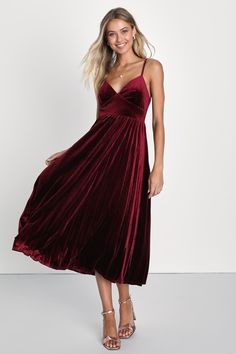 You'll be twirling through compliments and adoring glances all day long in the Lulus Unreal Charmer Burgundy Velvet Sleeveless Pleated Midi Dress! Plush and stretchy velvet shapes this romantic dress with adjustable spaghetti straps, a sweetheart neckline, and a triangle bodice. Set-in waist sits atop a fun, pleated skater skirt that falls to a chic midi hem. Hidden back zipper/clasp. Fit: This garment fits true to size. Length: Mid-calf length. Size medium measures 42" from adjustable straps to Plaid Print Skirt, Velvet Pleated Skirt, Burgundy Velvet Dress, Midi Skater Dress, Prom Midi Dress, Christmas Party Outfit, Fall Wedding Guest Dress, Prom Dress Stores, Christmas Party Outfits